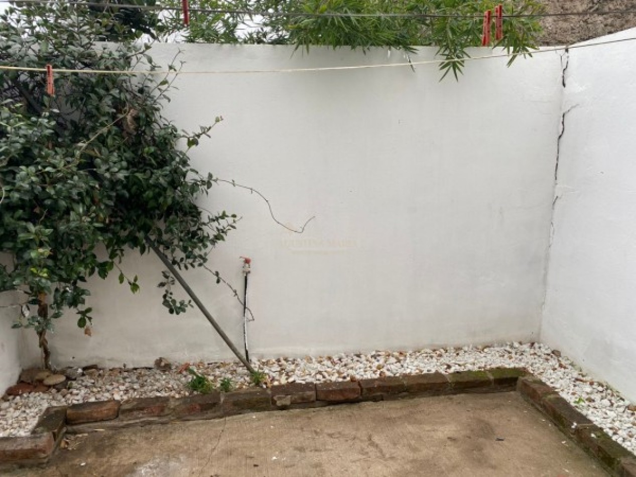 VENTA DEPARTAMENTO 2 AMBIENTES CON PATIO Y COCHERA